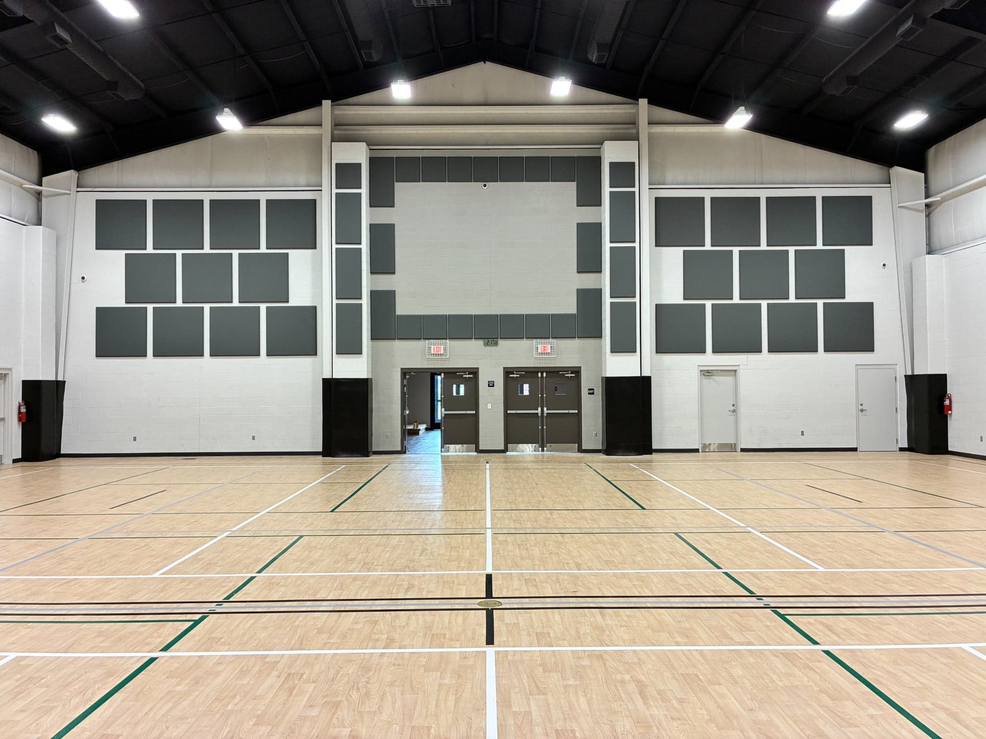 Acoustic panels mounted on the walls of a church worship space
